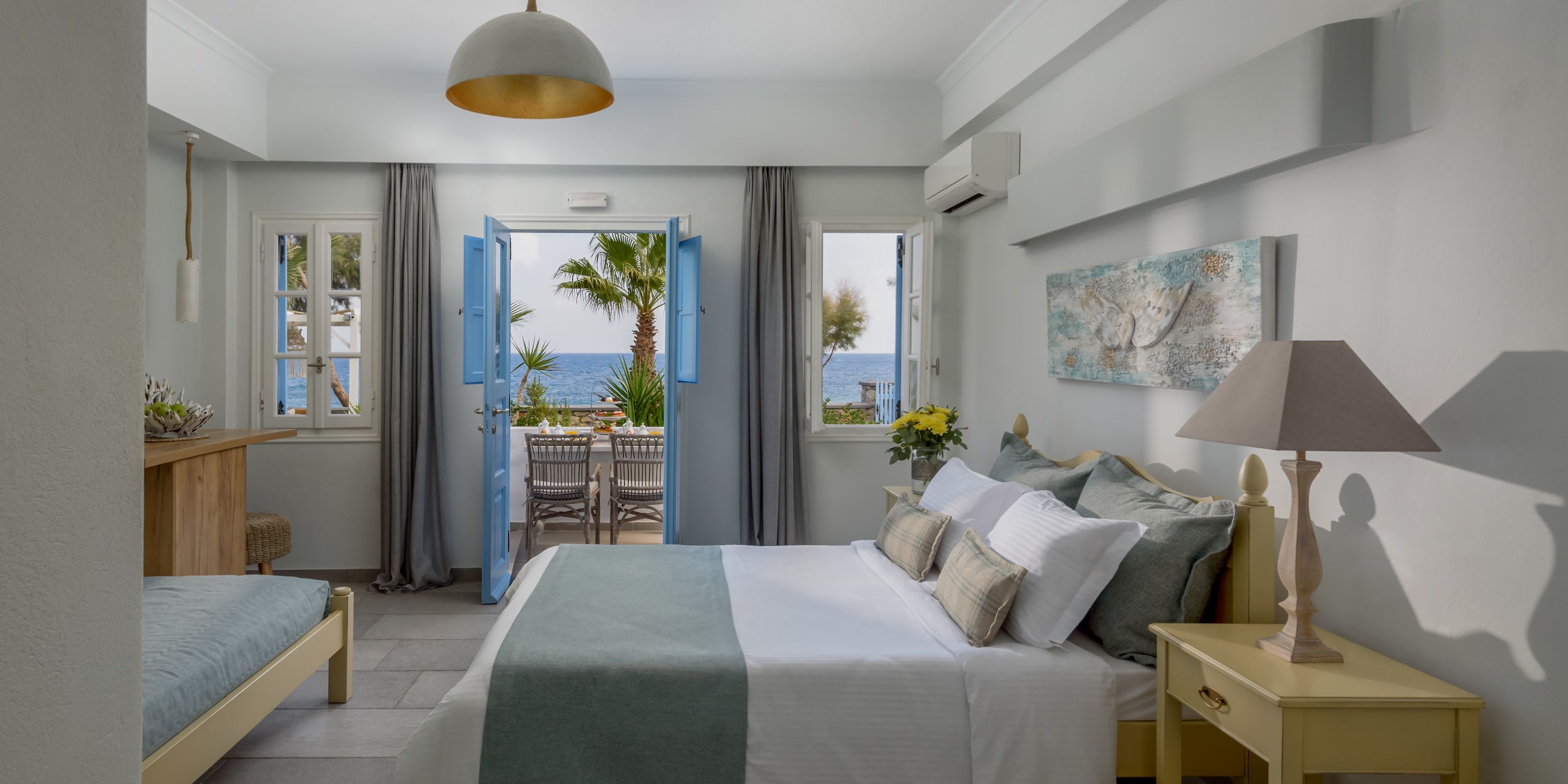 triple room, beachfront (triple) | in-room safe, individually decorated, desk, iron/ironing board
