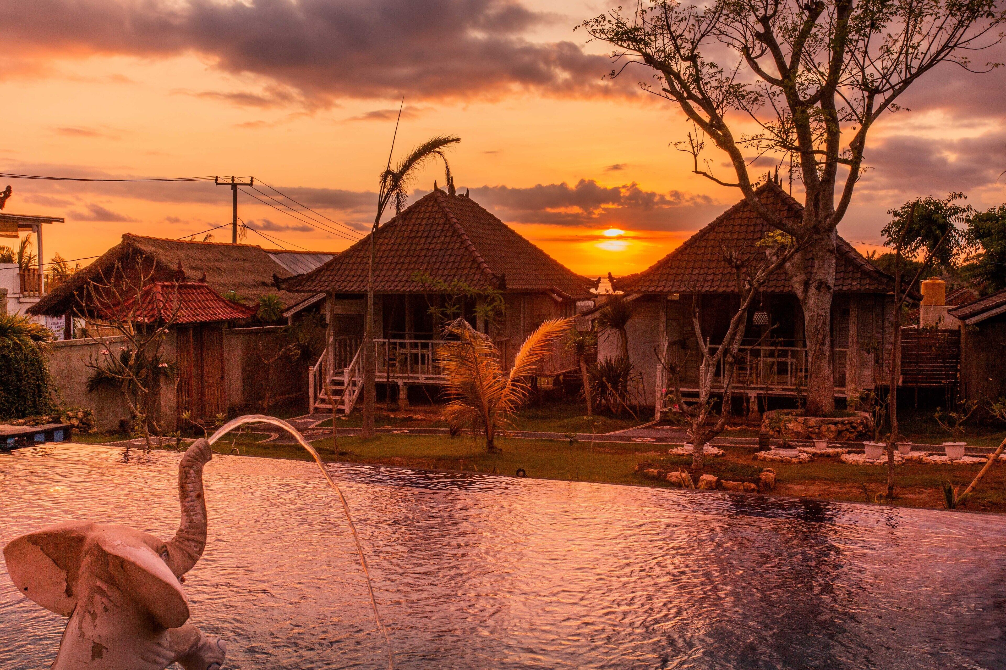 2 outdoor pools, pool umbrellas, pool loungers