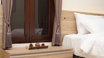 Deluxe Twin Room with Balcony | Minibar, in-room safe, individually decorated, individually furnished