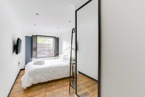 2 chambres, literie de qualité supérieure, fer et planche à repasser
