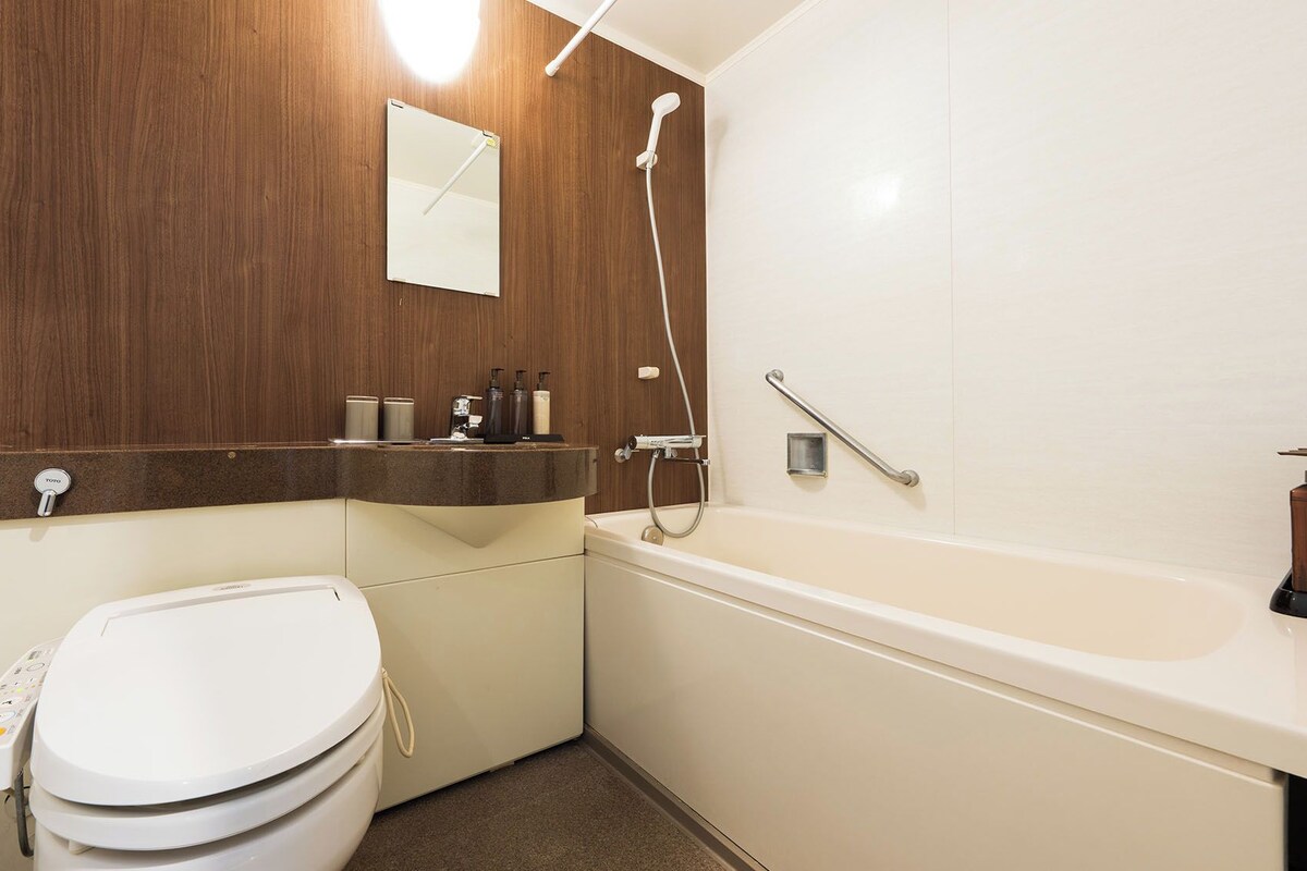 Slippers, electronic bidet, towels