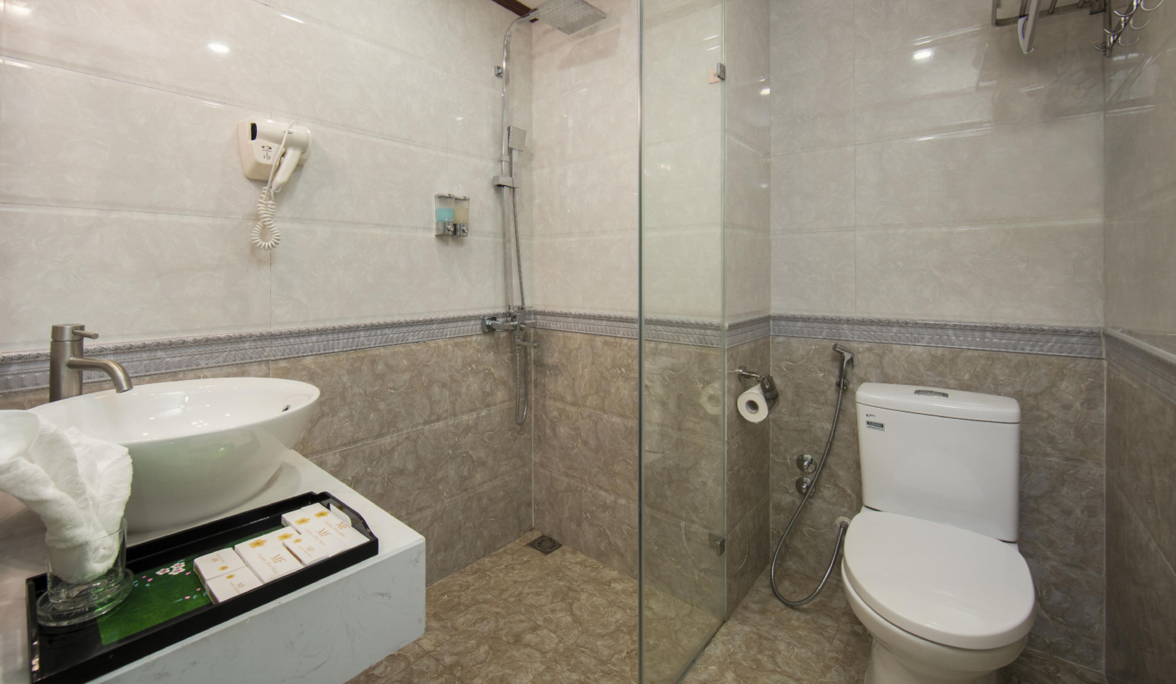 shower, free toiletries, hair dryer, slippers