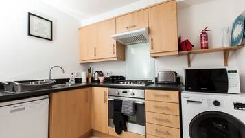 Premium Apartment, 2 Bedrooms, Ground Floor | Private kitchen | Full-size fridge, microwave, oven, stovetop