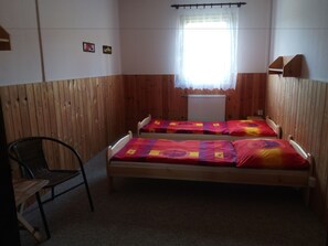 Suite familiar | Cortinas blackout, camas extra, wifi gratis y ropa de cama