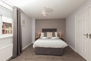 Premium Apartment, 2 Bedrooms, Ground Floor | 2 bedrooms, individually decorated, individually furnished, desk