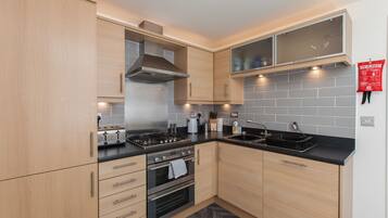 Premium Apartment, 2 Bedrooms, Ground Floor | Private kitchen | Full-size fridge, microwave, oven, stovetop
