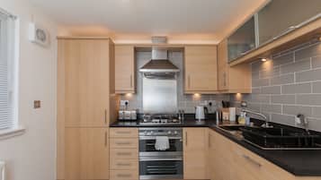 Premium Apartment, 2 Bedrooms, Ground Floor | Private kitchen | Full-sized fridge, microwave, oven, stovetop