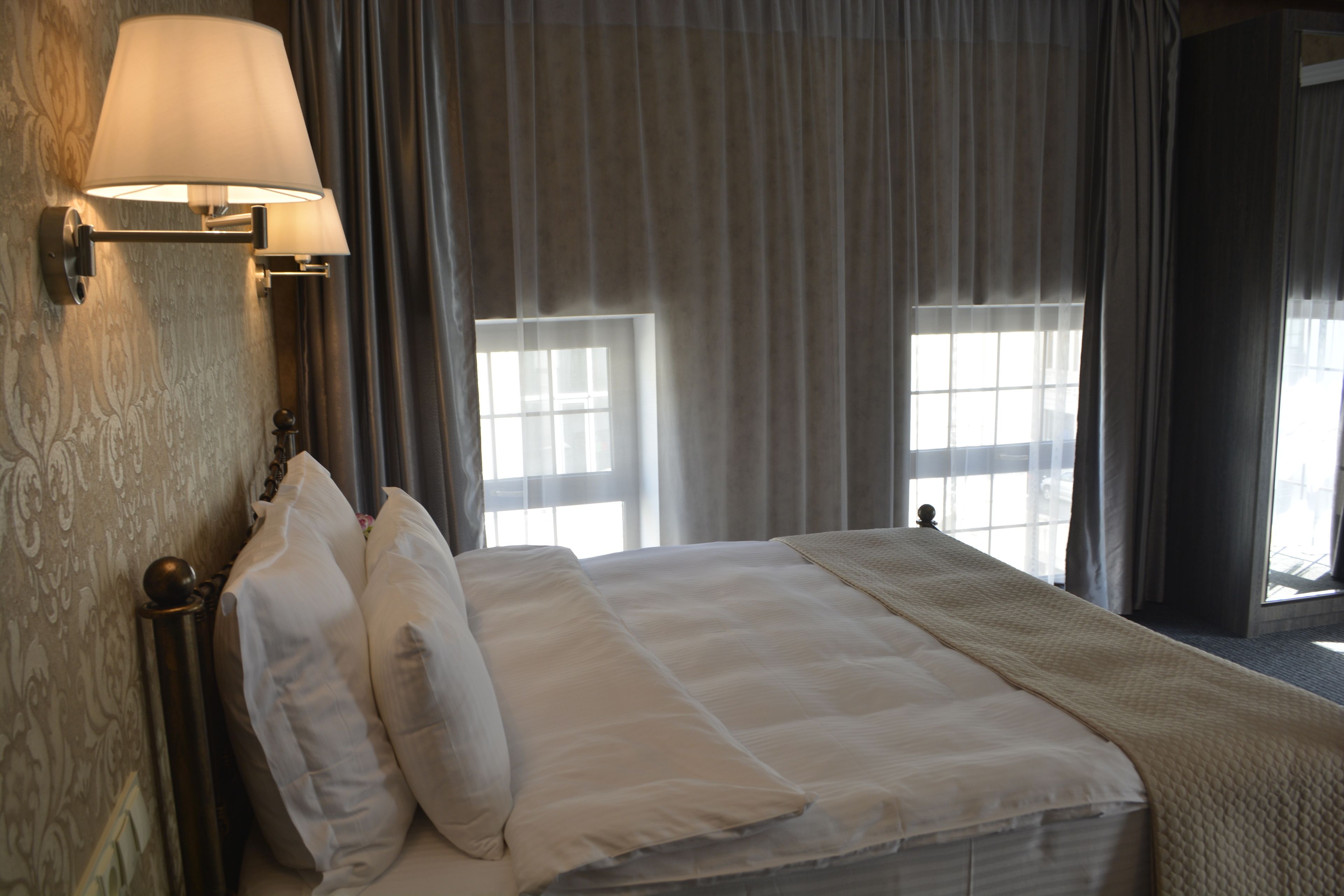 junior double room, 1 king bed | premium bedding, minibar, in-room safe, blackout curtains