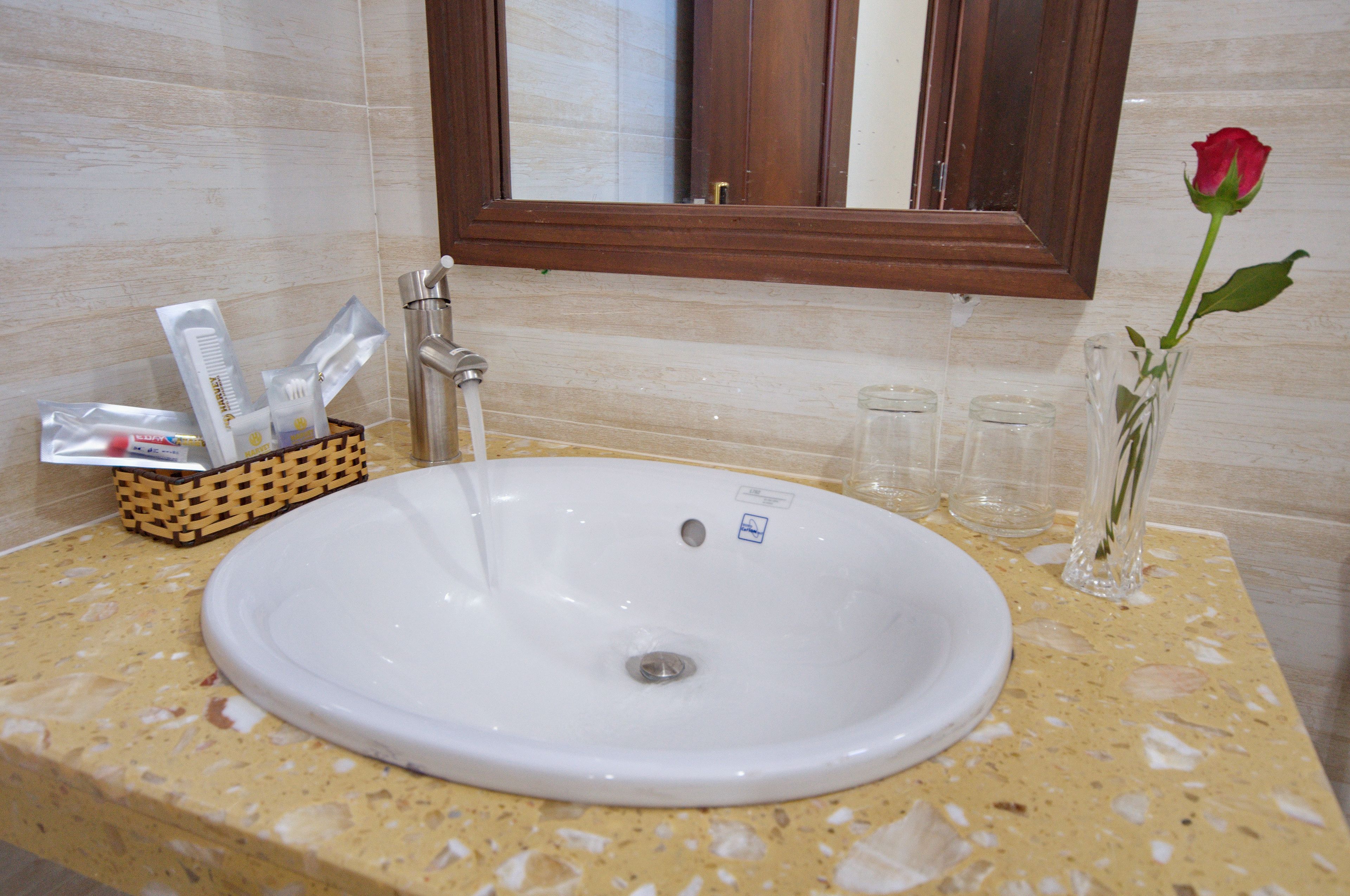 superior double room, city view | bathroom sink