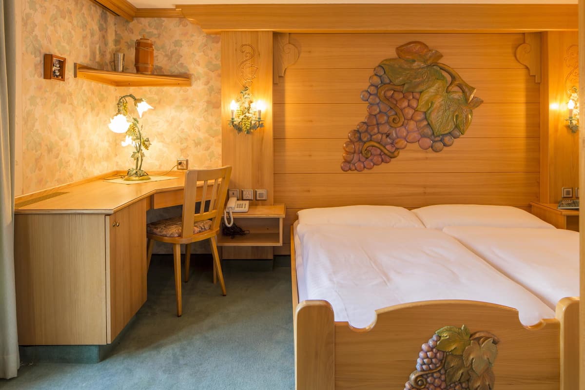 Habitación familiar | Escritorio, wifi gratis y ropa de cama