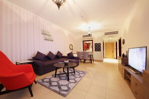 Apartment, 1 Bedroom | Living area | 40-inch LCD TV with cable channels, TV - Piks Key - Miska 3 (Dubai)