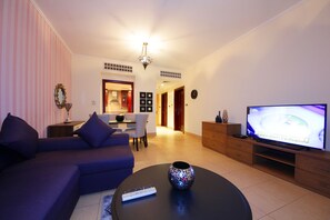 Apartment, 1 Bedroom | Living area | 40-inch LCD TV with cable channels, TV - Piks Key - Miska 3 (Dubai)