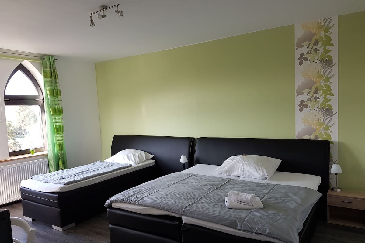 Hypo-allergenic bedding, minibar, desk, blackout curtains