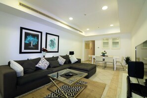 Apartment, 2 Bedrooms | Living area | 40-inch LCD TV with cable channels, TV - Piks Key - Princess Tower (Dubai)