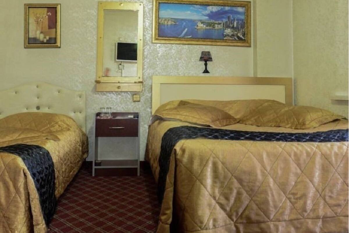 Familiekamer | 1 slaapkamer, luxe beddengoed, een bureau, een strijkplank/strijkijzer