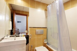 A bathroom with a sink, mirror, shower, and toilet. - Piks Key- Marina Diamond 3 (Dubai)