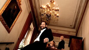 A grand staircase with ornate railings and a chandelier. - Bäckaskog Slott (Fjalkinge)