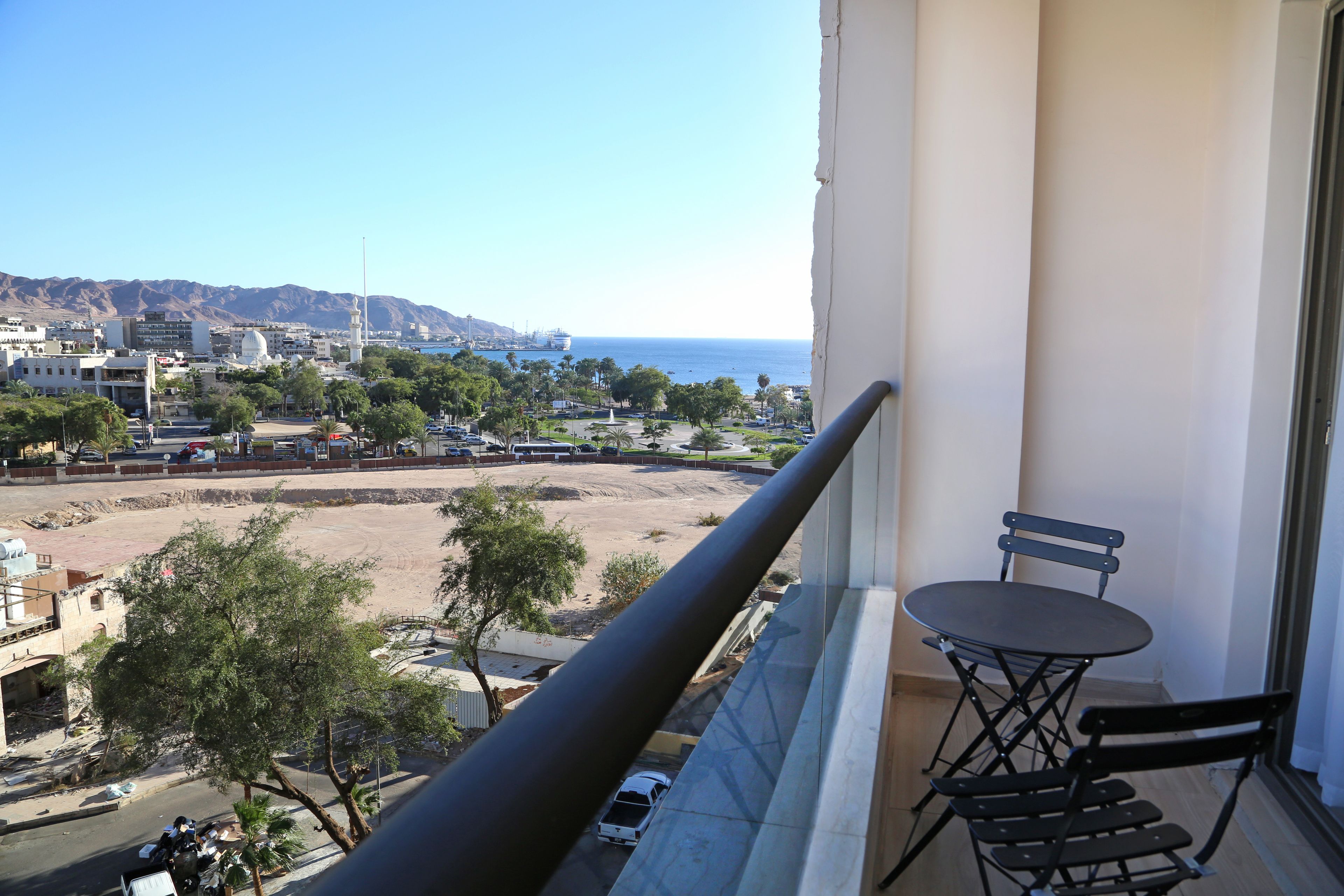 Deluxe Room, 1 Bedroom, Refrigerator, Partial Sea View | In-room safe, desk, soundproofing, iron/ironing board