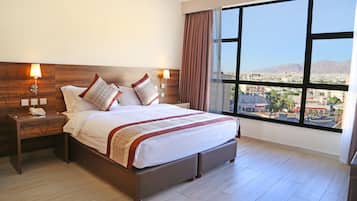 Superior Room, 1 Bedroom, City View, Courtyard Area | In-room safe, desk, soundproofing, iron/ironing board