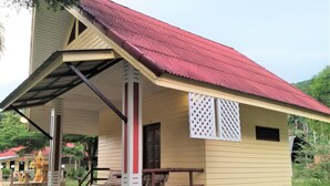 A two-story building with a red roof and a covered porch. - Happy Home Resort (Khlong Yai)