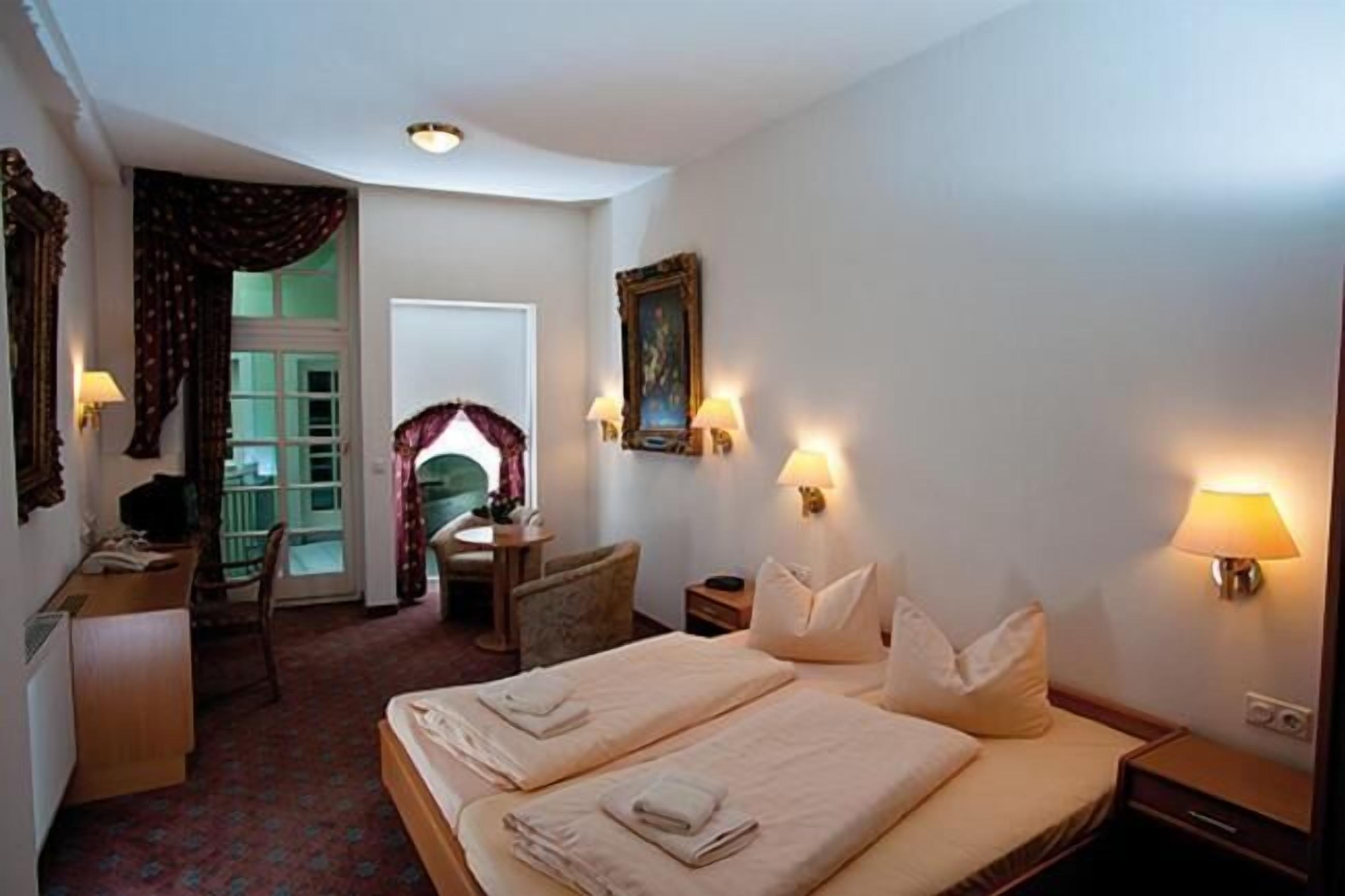 desk, blackout curtains, free wifi, bed sheets