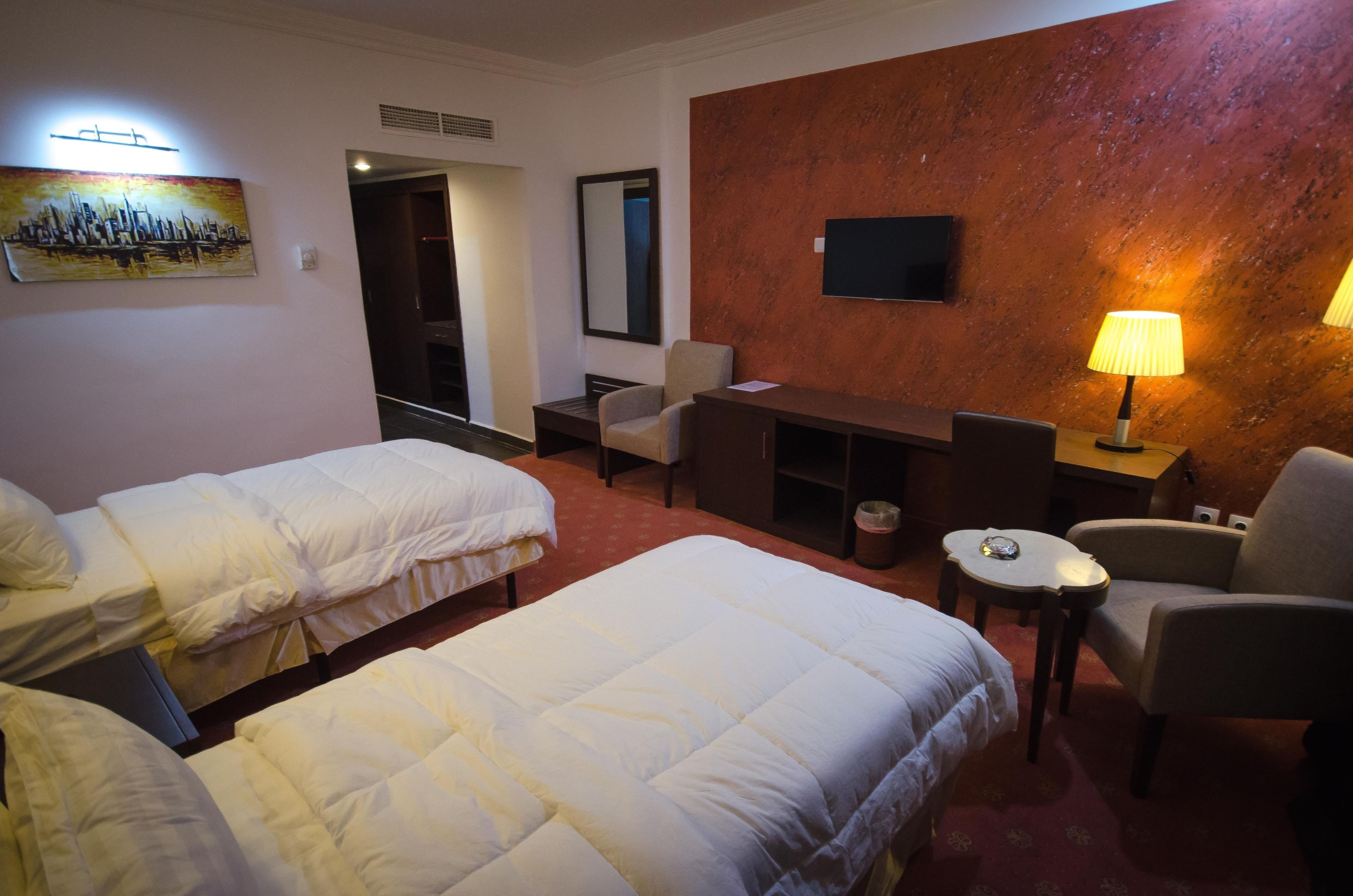 desk, blackout curtains, free wifi, bed sheets