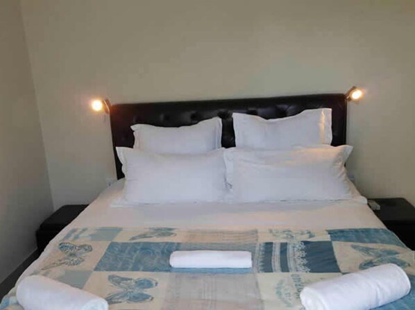 Coffres-forts dans les chambres, bureau, fer et planche à repasser