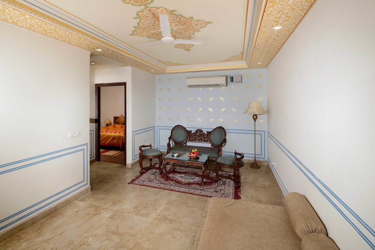 Luxury Suite, 2 Bedrooms, 2 Bathrooms | Living room | Flat-screen TV