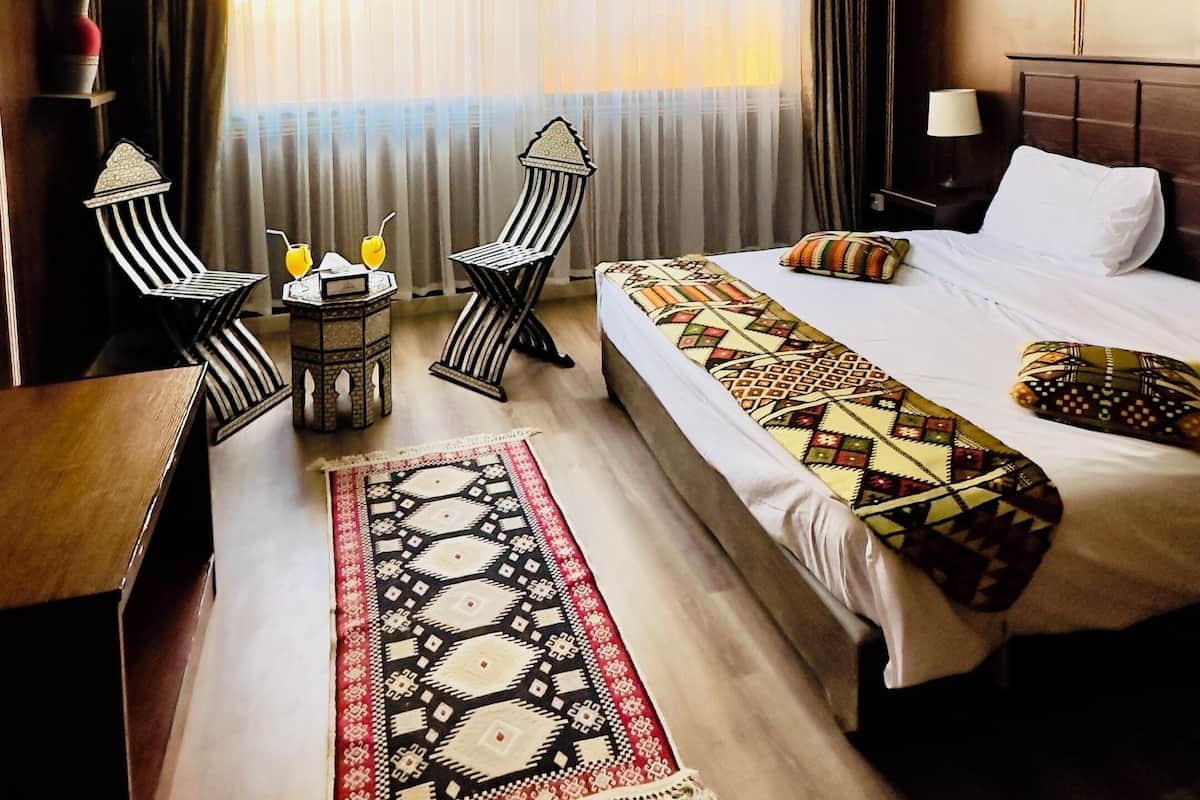 Premium bedding, down duvets, blackout curtains, soundproofing