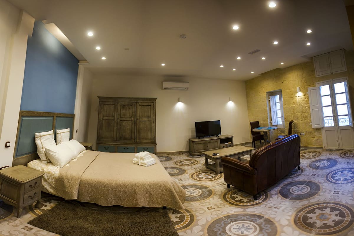 Suite, City View | Premium bedding, in-room safe, individually furnished, blackout curtains