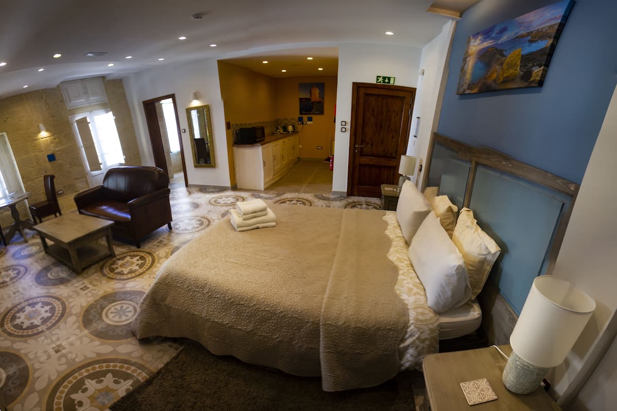 Suite, City View | Premium bedding, in-room safe, individually furnished, blackout curtains