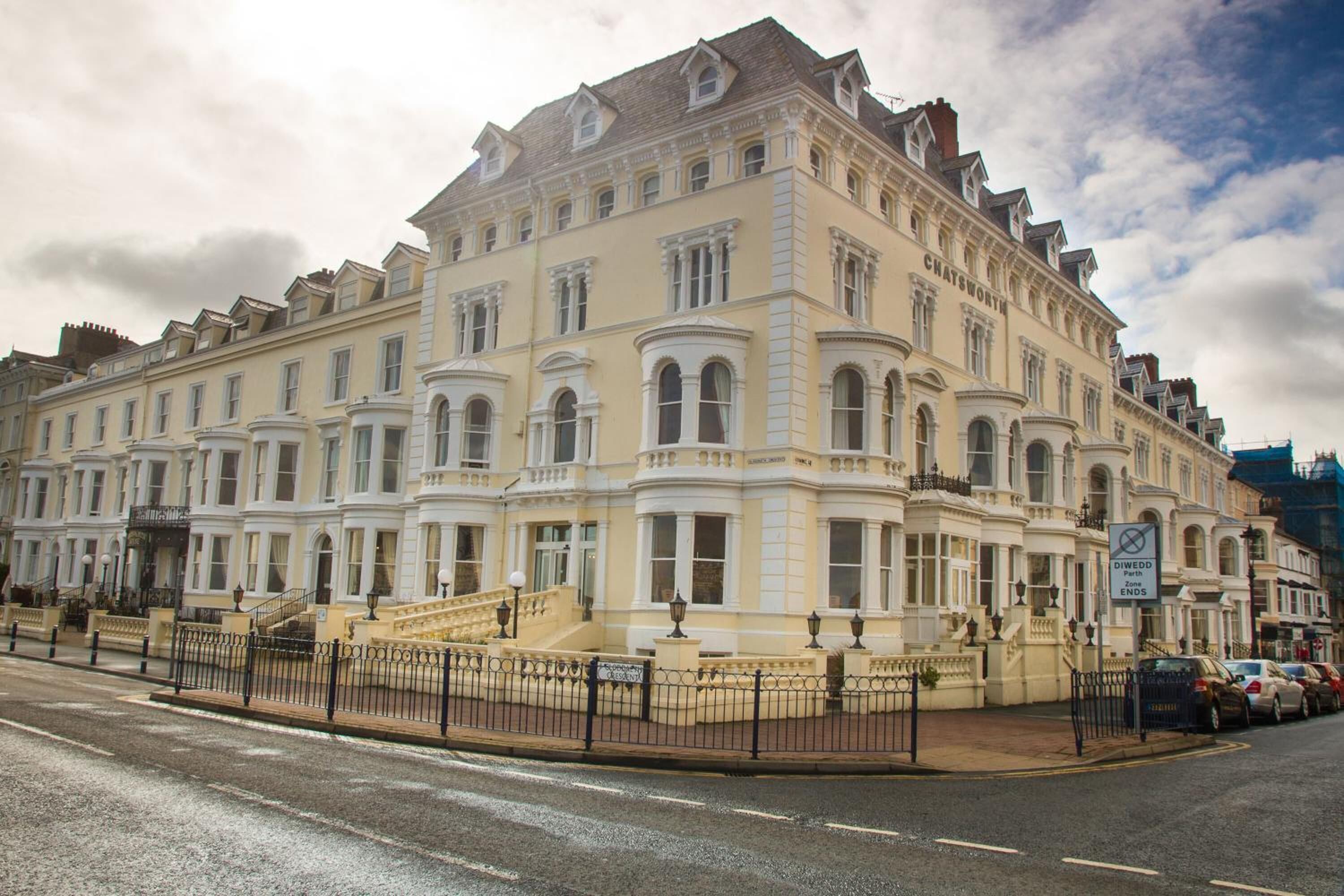 A large, historic building with multiple stories and a classic architectural style.