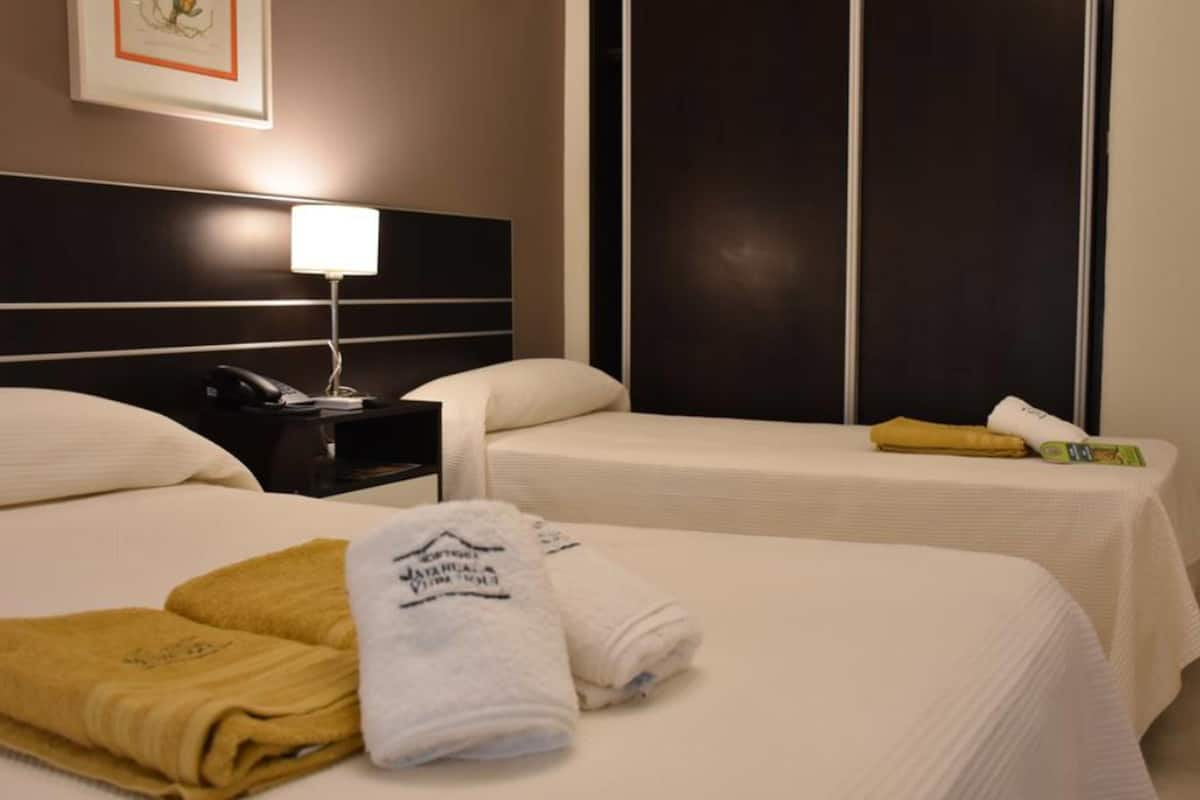 triple room | premium bedding, in-room safe, iron/ironing board, free cots/infant beds