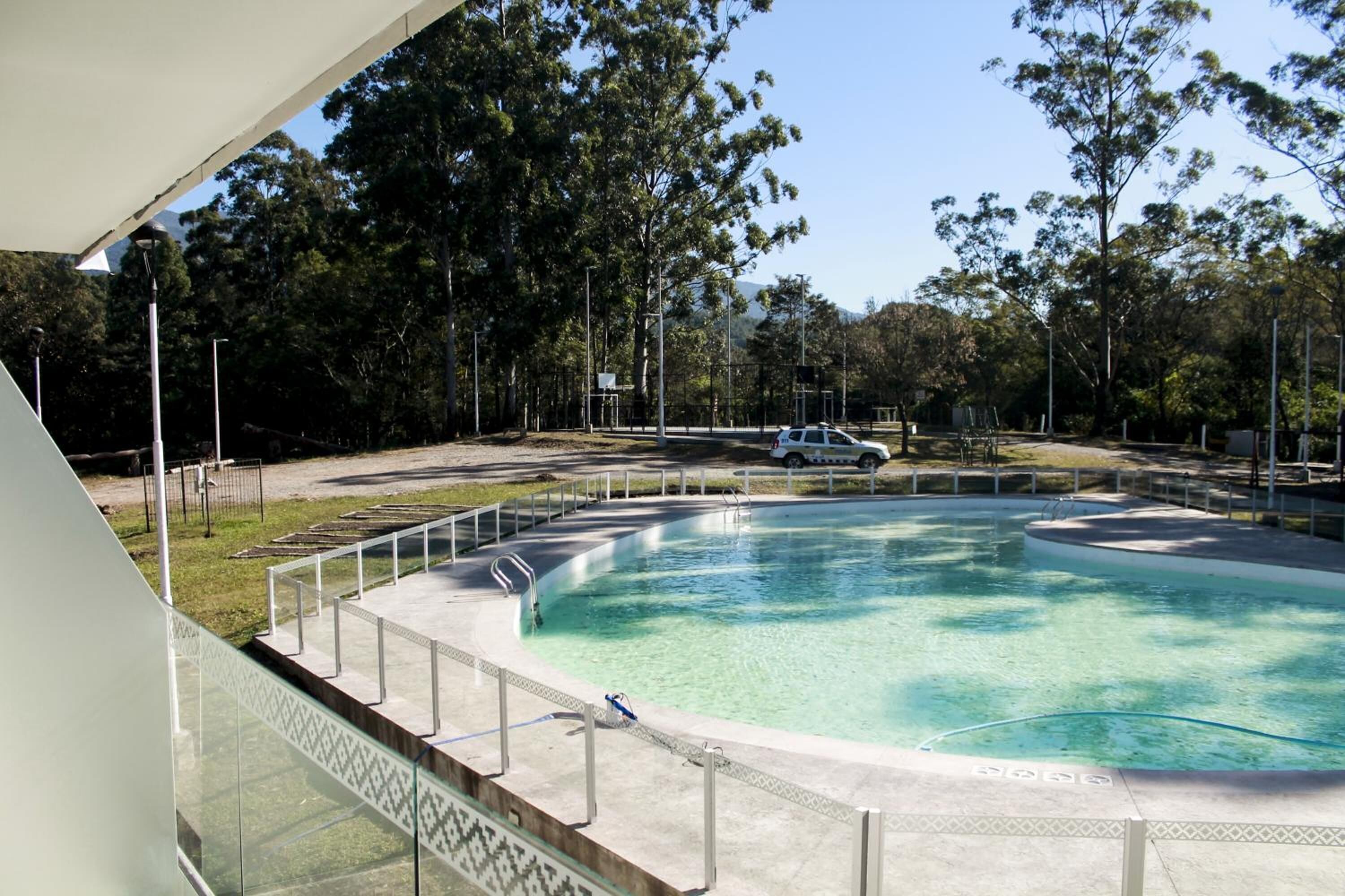 outdoor pool, pool umbrellas, pool loungers