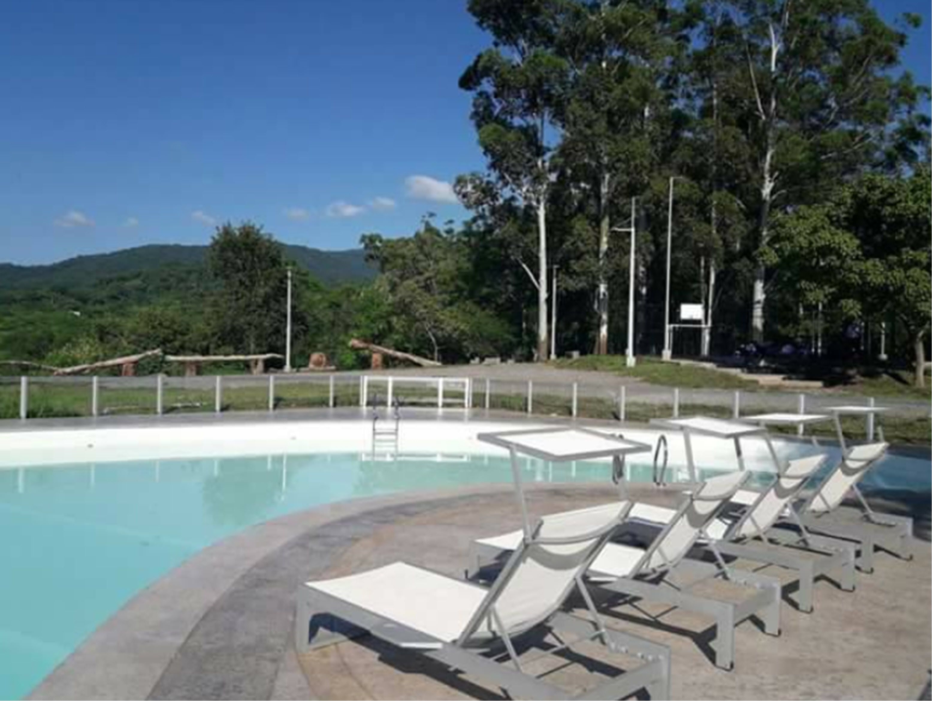 Seasonal outdoor pool, pool umbrellas, pool loungers