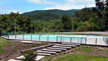 Outdoor pool, pool umbrellas, sun loungers