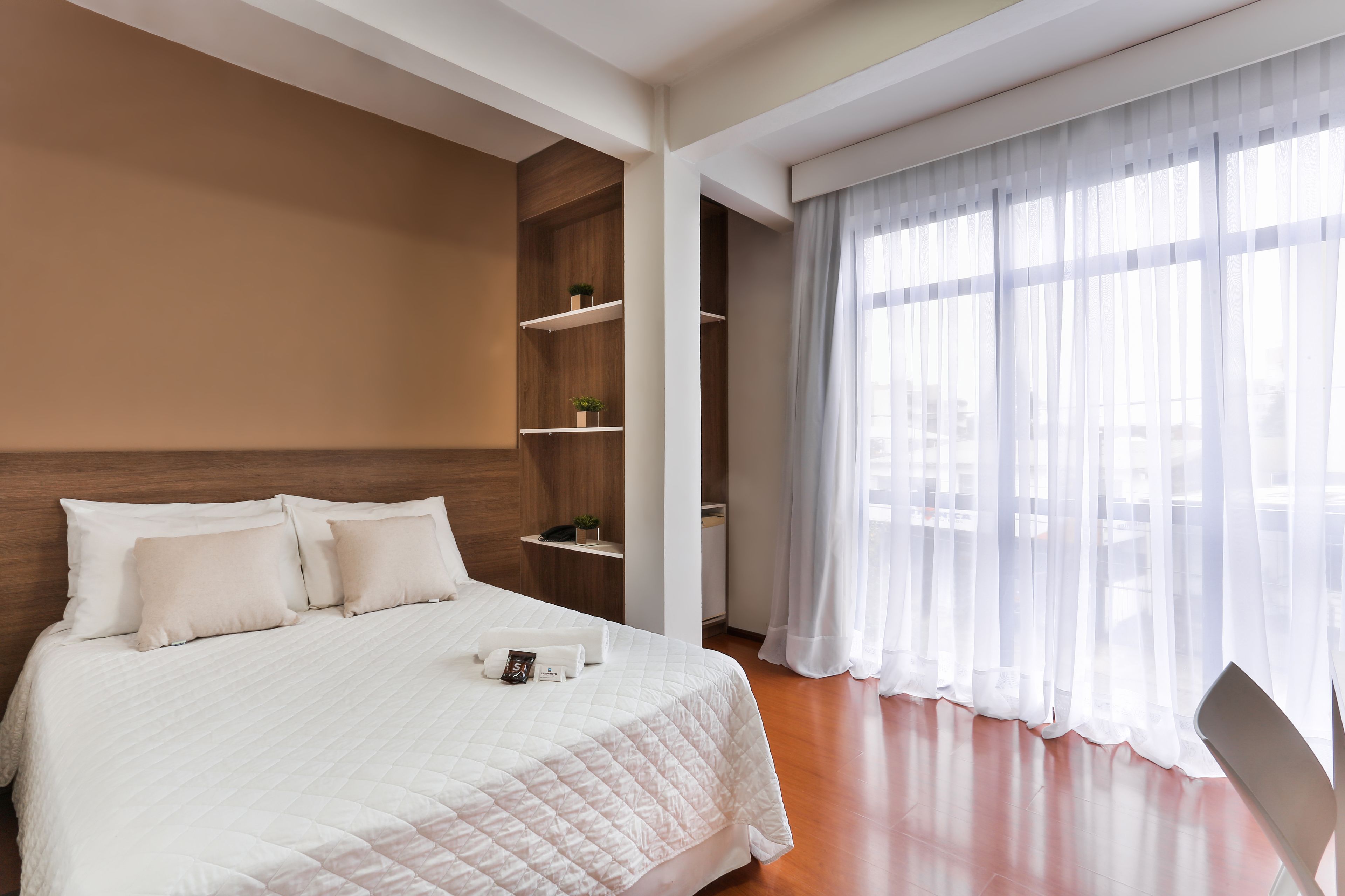 deluxe double room | premium bedding, minibar, desk, blackout curtains