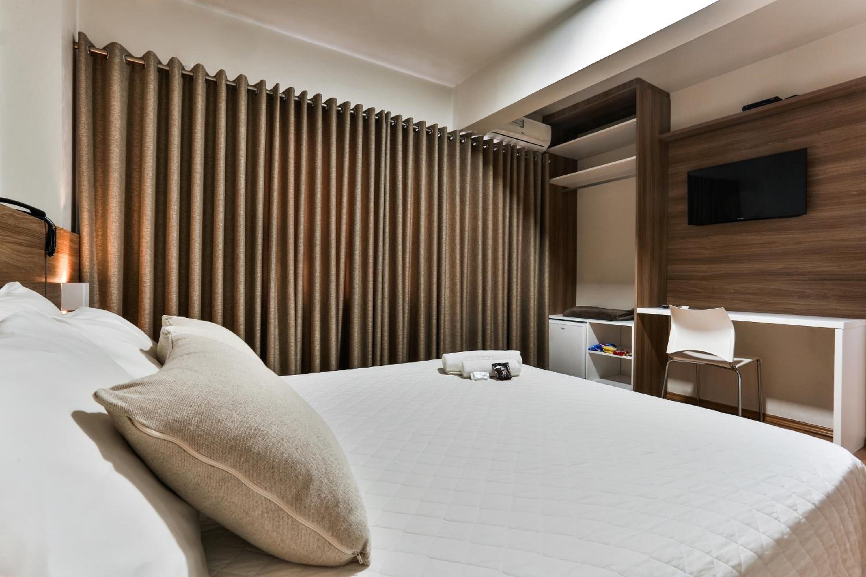 premium bedding, minibar, desk, blackout curtains