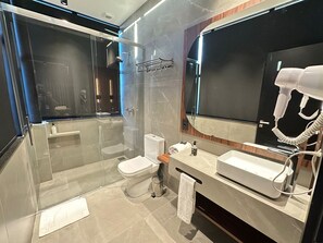 Shower, free toiletries, hair dryer, towels