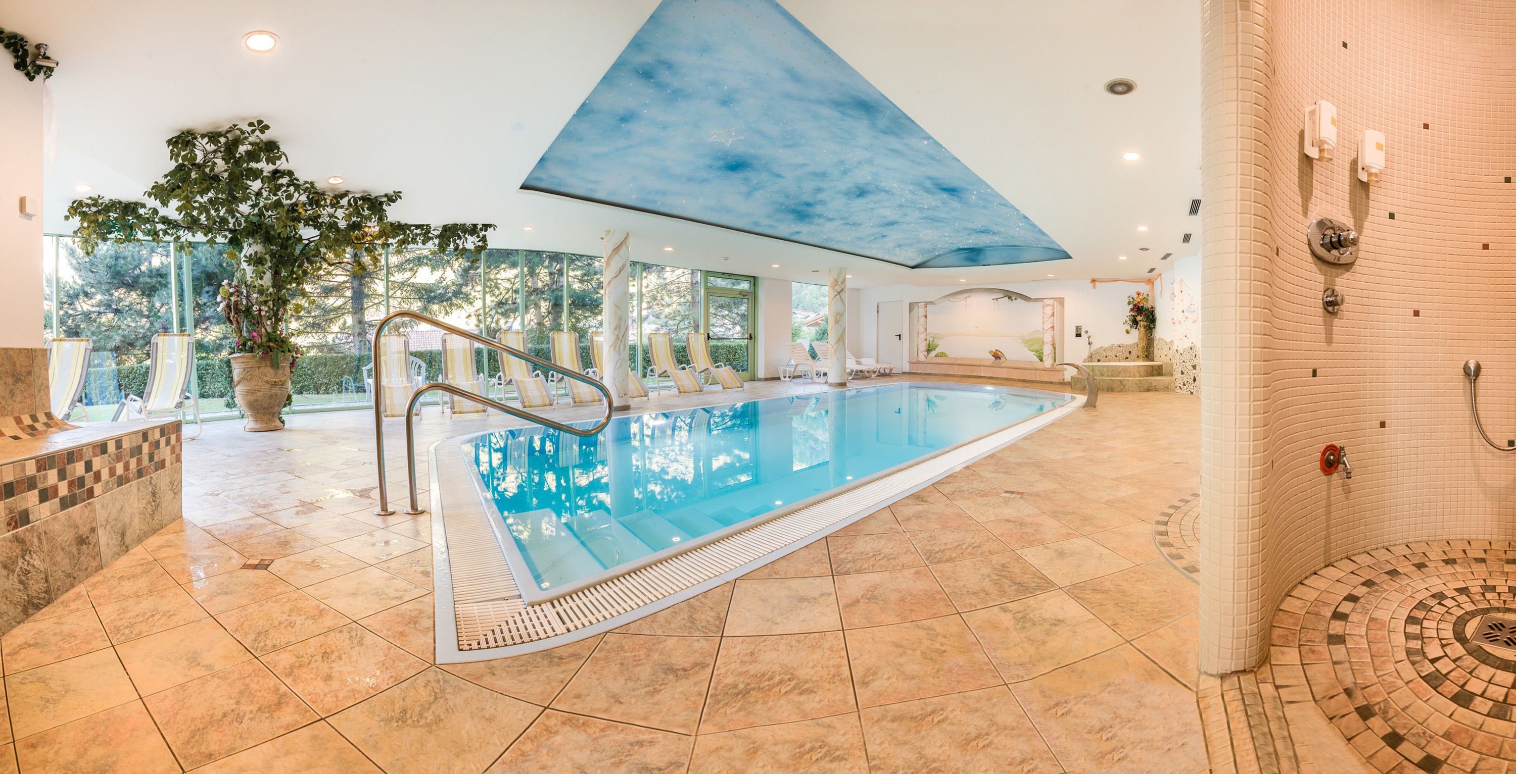 indoor pool, open 7 am to 7:30 pm, pool umbrellas, pool loungers