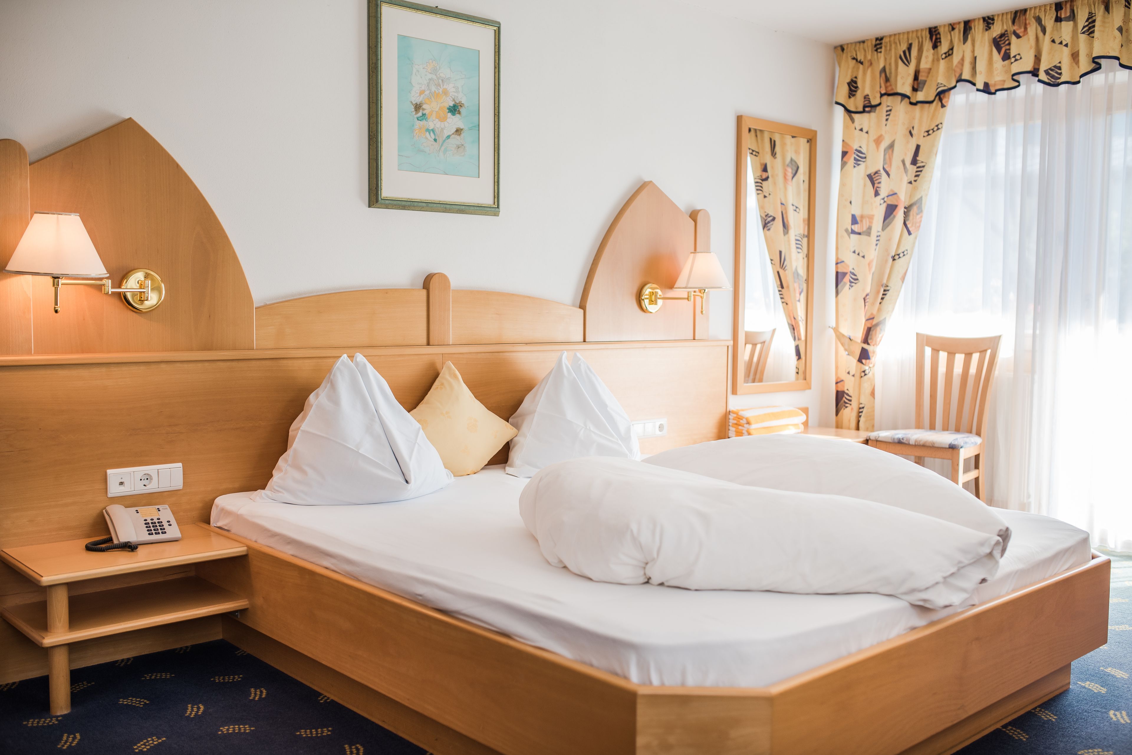 deluxe double room | premium bedding, down duvets, in-room safe, desk