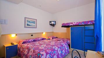 A hotel room with a bunk bed, a desk with a chair, a television, and a painting on the wall.