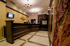 Check-in/check-out kiosk