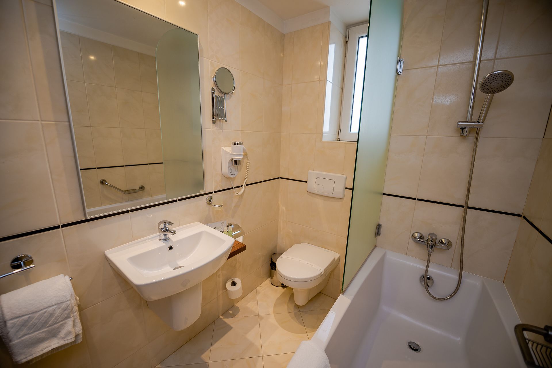 basic twin room, 2 single beds | bathroom | deep-soaking bathtub, free toiletries, dressing gowns, towels