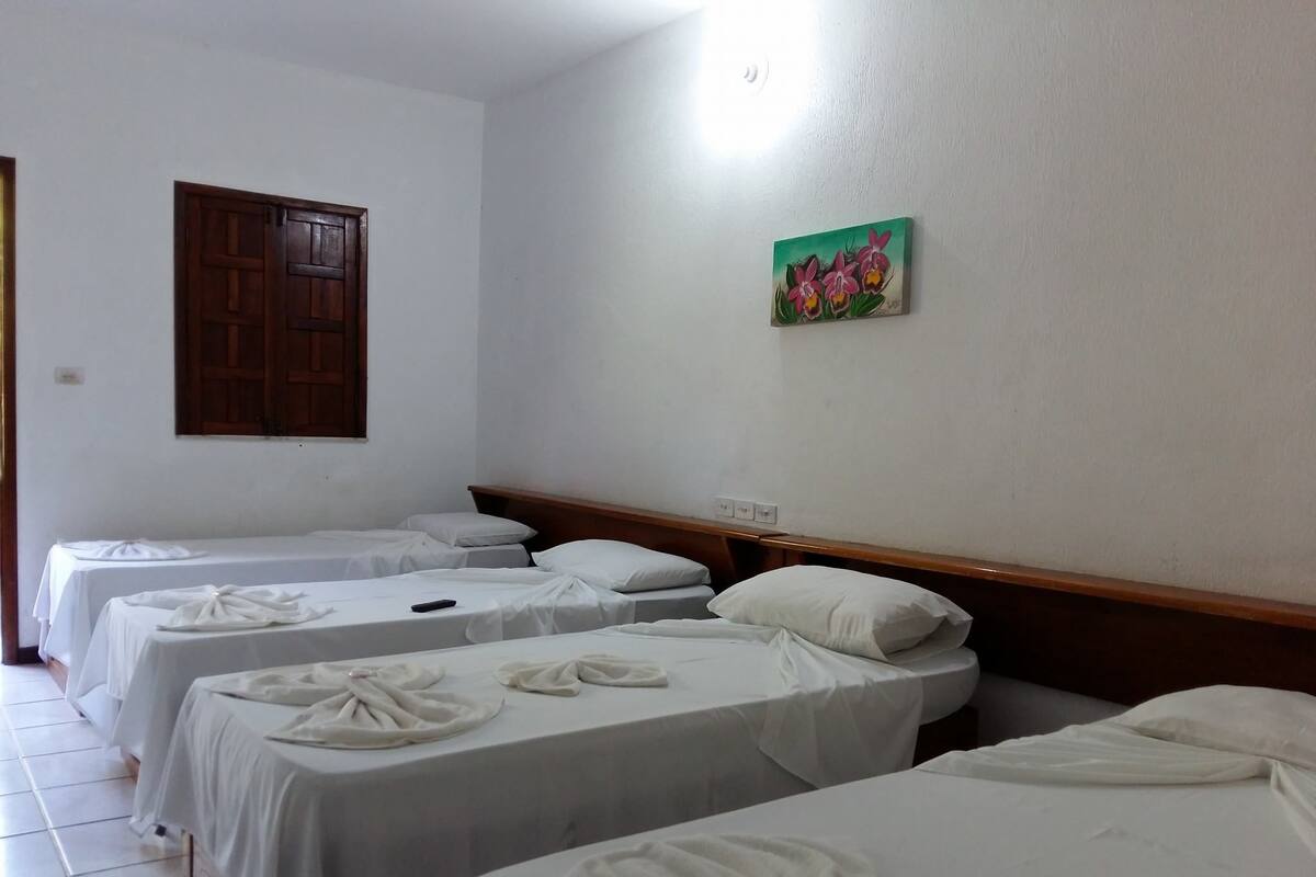 Quadruple Room | Minibar, blackout curtains, iron/ironing board (on request), bed sheets