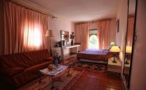 Habitación triple estándar | Vistas al jardín