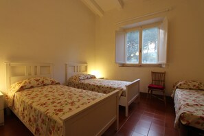 Individually decorated, individually furnished, desk, rollaway beds