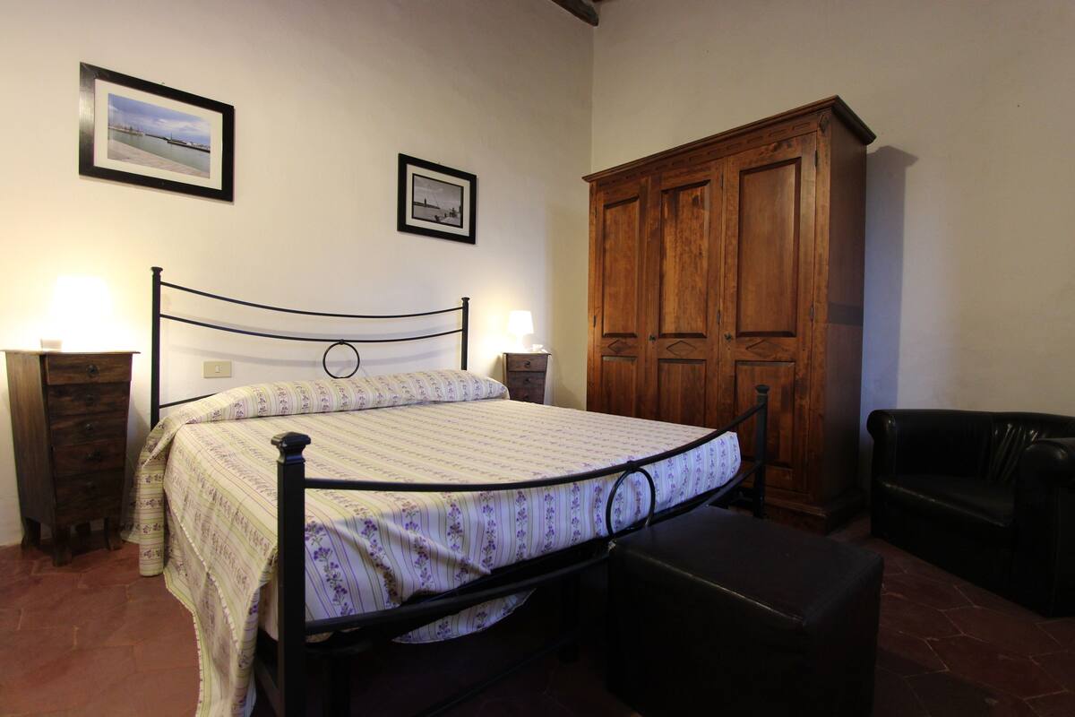 Individually decorated, individually furnished, desk, rollaway beds