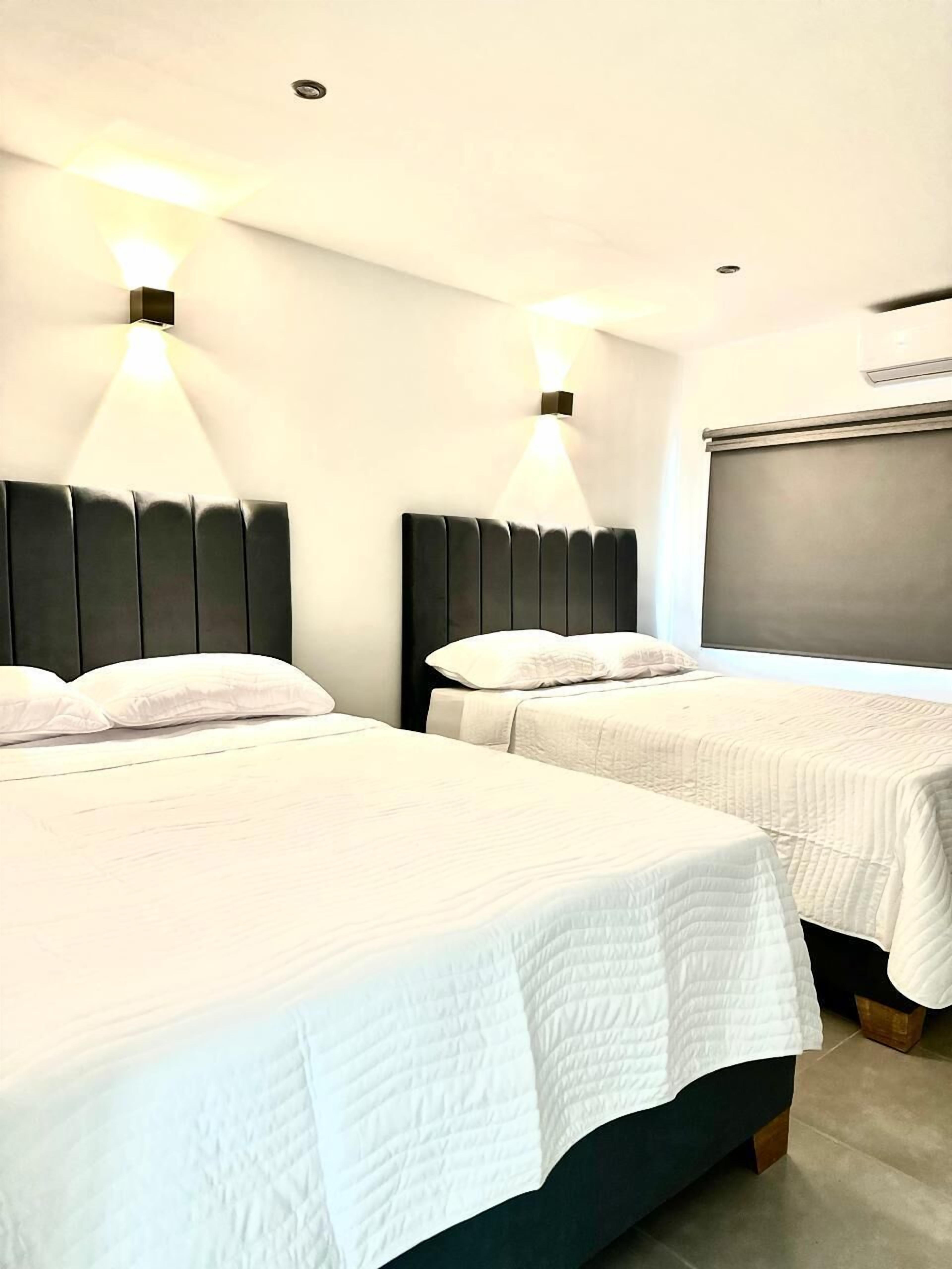 Standard Room, 2 Bedrooms, Beach View, Tower | Premium bedding, down duvets, minibar, in-room safe