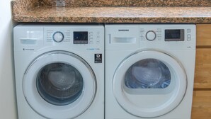 Two Samsung washing machines side by side. - Paradise at Little Bay Cournty Club (Negril)